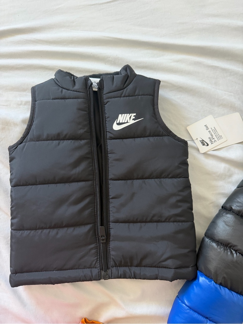 Nike Kids Black Puffer Vest with White Logo